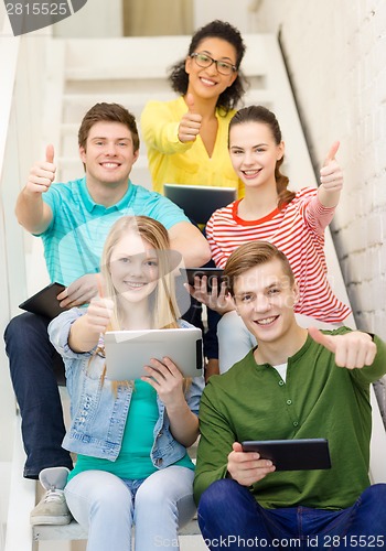 Image of smiling students with tablet pc computer