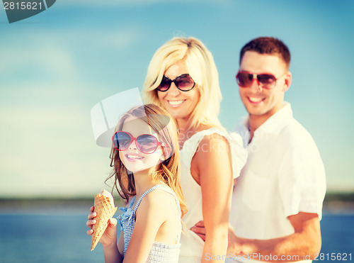 Image of happy family eating ice cream