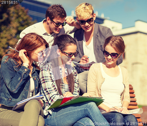 Image of group of students or teenagers hanging out