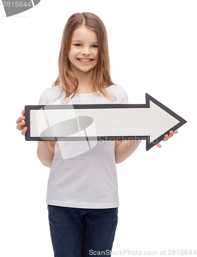 Image of smiling girl with blank arrow pointing right
