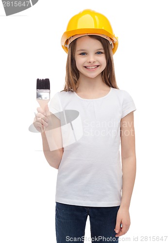 Image of smiling little girl in helmet with paint roller