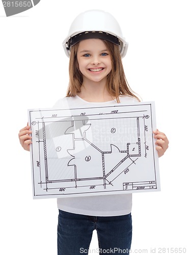 Image of smiling little girl in helmet showing blueprint