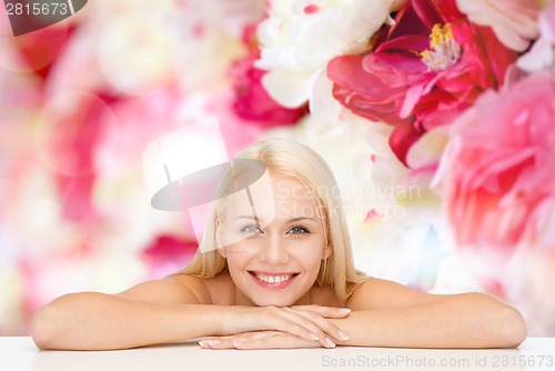 Image of clean face and shoulders of beautiful young woman