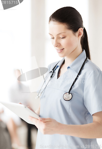 Image of female doctor with tablet pc