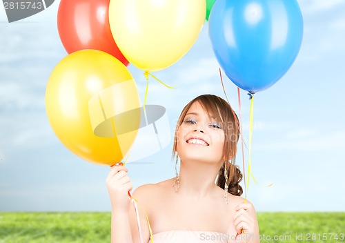 Image of happy teenage girl with balloons