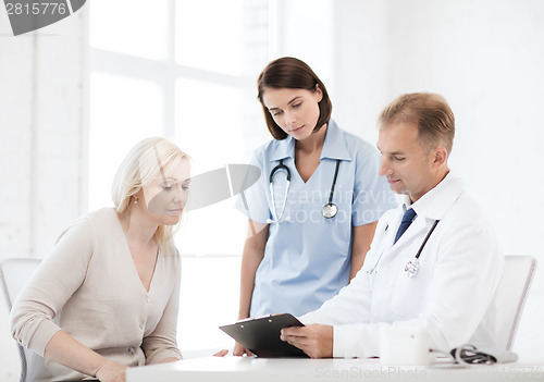 Image of doctor with patient in hospital