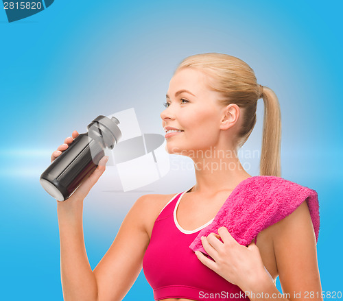 Image of sporty woman with special sportsman bottle