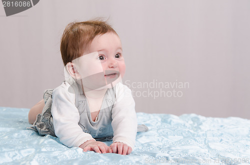 Image of Six-month girl on the couch