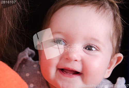 Image of Portrait of cheerful six-month baby