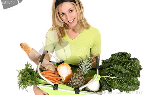 Image of Female with eco shopping bag filled with groceries