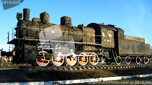 Image of Ancient black steam locomotive