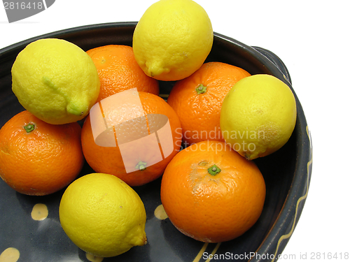 Image of Ceramic pot with citrons and tangerine on white background