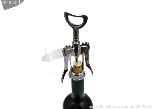 Image of Red wine and corkscrew
