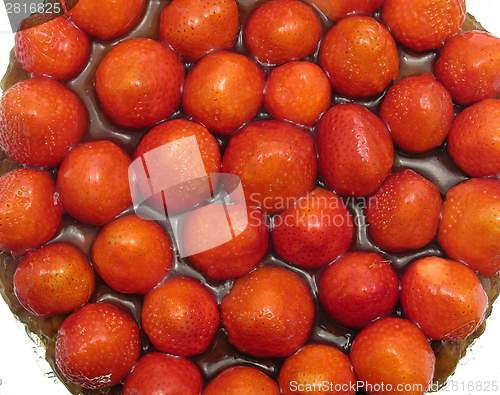 Image of Close-up view of a strawberry cake on white background