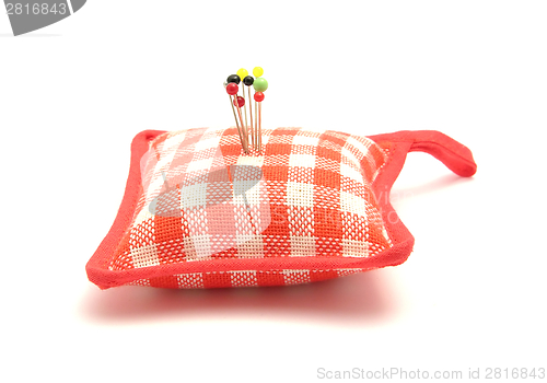 Image of Pin cushion with several pins