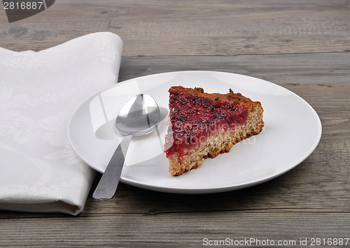 Image of Red currant cake on wood