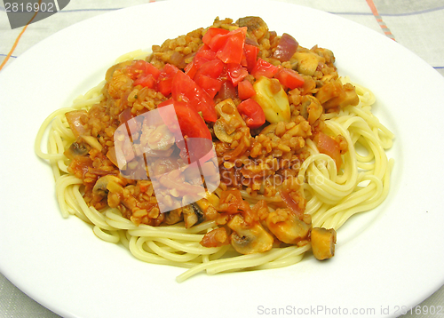 Image of Bulgur wheat groats with noodles and tomatoes