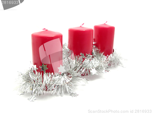 Image of Red candles with christmas decoration