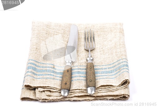 Image of Ancient cutlery on linen
