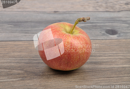 Image of Apple on wood