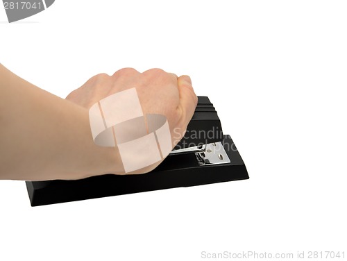 Image of Hand on stapler 