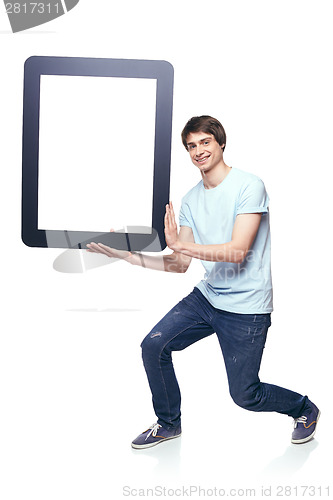 Image of Full length man carrying tablet frame