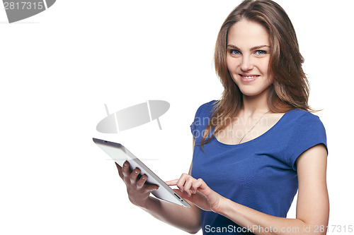 Image of Woman using digital tablet