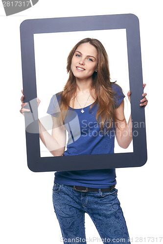 Image of Woman holding tablet frame