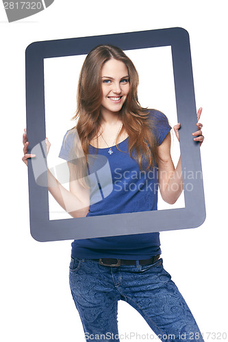 Image of Woman holding tablet frame