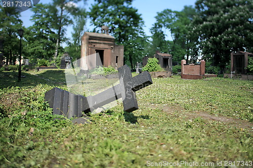 Image of felled grave cross