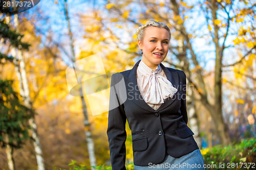 Image of Girl walking in the park