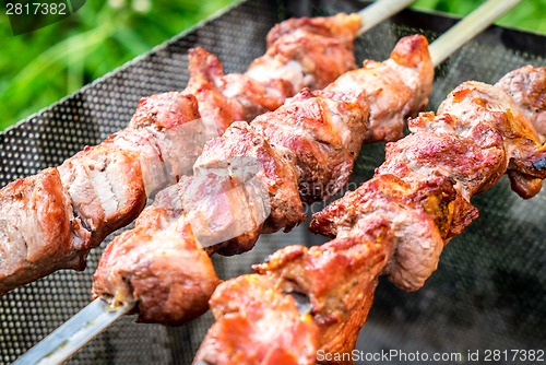 Image of Hot shish kebab on metal skewers