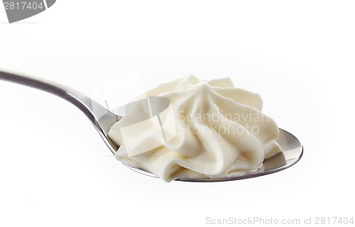 Image of whipped cream in a spoon