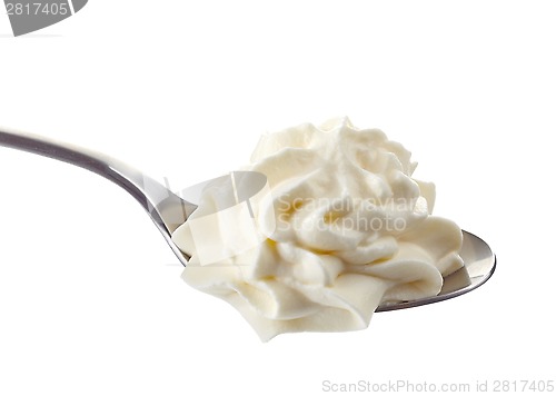 Image of whipped cream in a spoon