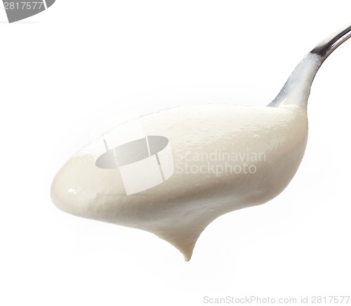 Image of Spoon with cream