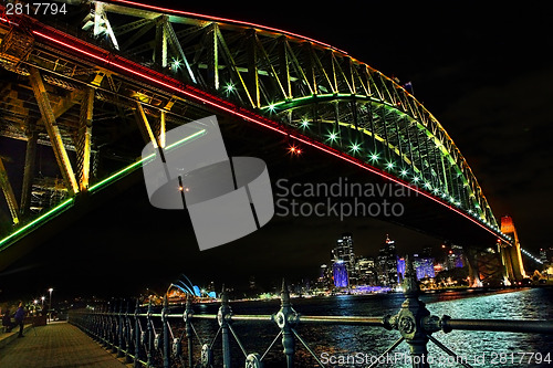 Image of Sydney Harbour Bridge in rvibrant colors during Vivid sydney