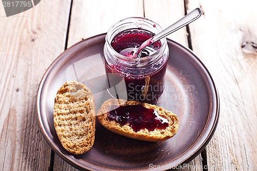 Image of black currant jam in glass jar