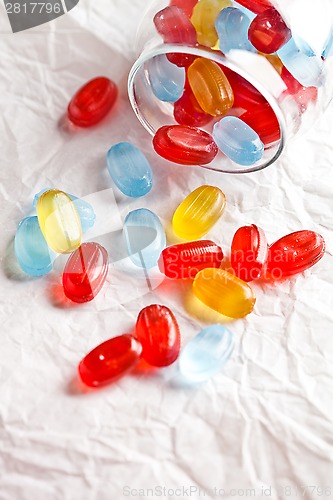 Image of colorful candies in glass jar