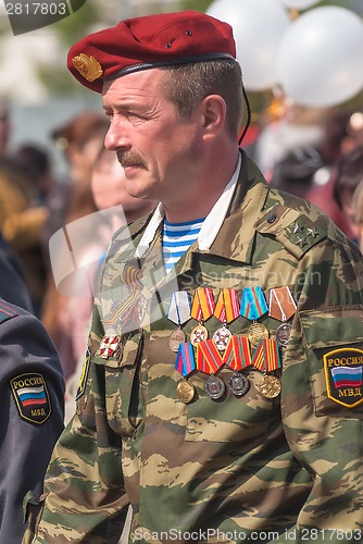 Image of Colonel of police on Victory Day parade