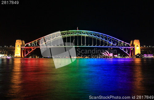 Image of Iconic Sydney Harbour Bridge in rainbow colour during Vivid Sydn