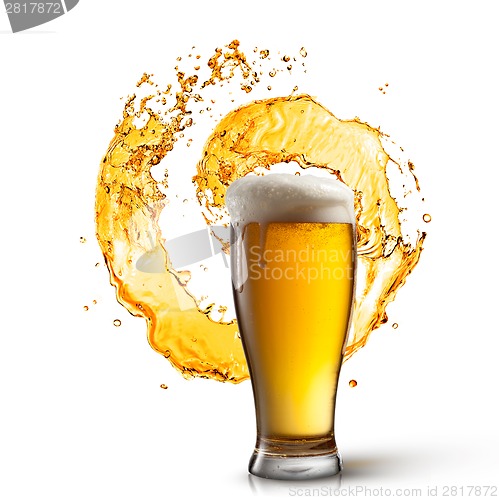 Image of Beer in glass with splash isolated on white