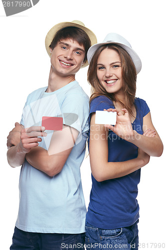 Image of Happy couple showing credit cards