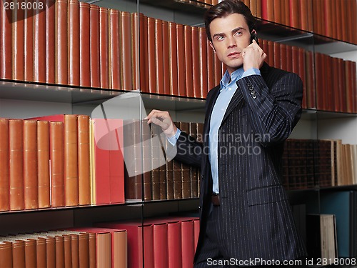 Image of Businessman working at office aa