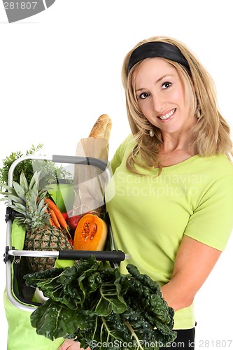 Image of Woman displaying bag full of groceries