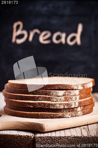 Image of slices of rye bread and blackboard