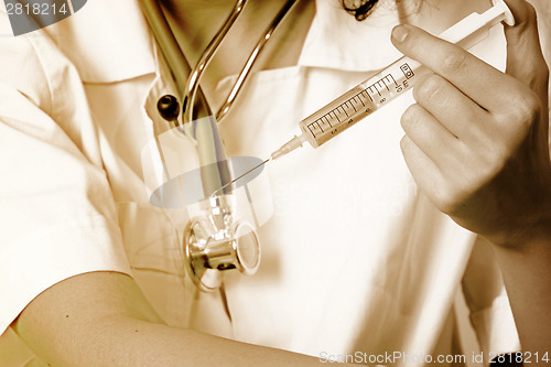 Image of Portrait of a young doctor with stethoscope.