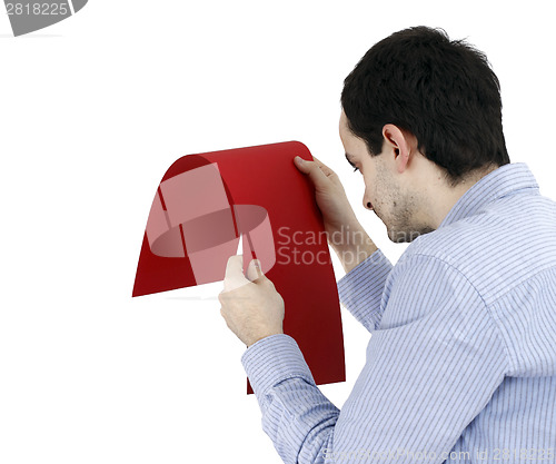 Image of Man holding a paper