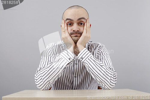 Image of Man at desk