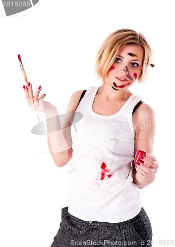 Image of Pretty female painter with dirty face