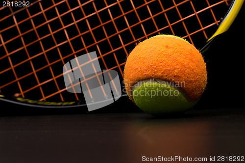 Image of Tennis ball for kids with tennis racket